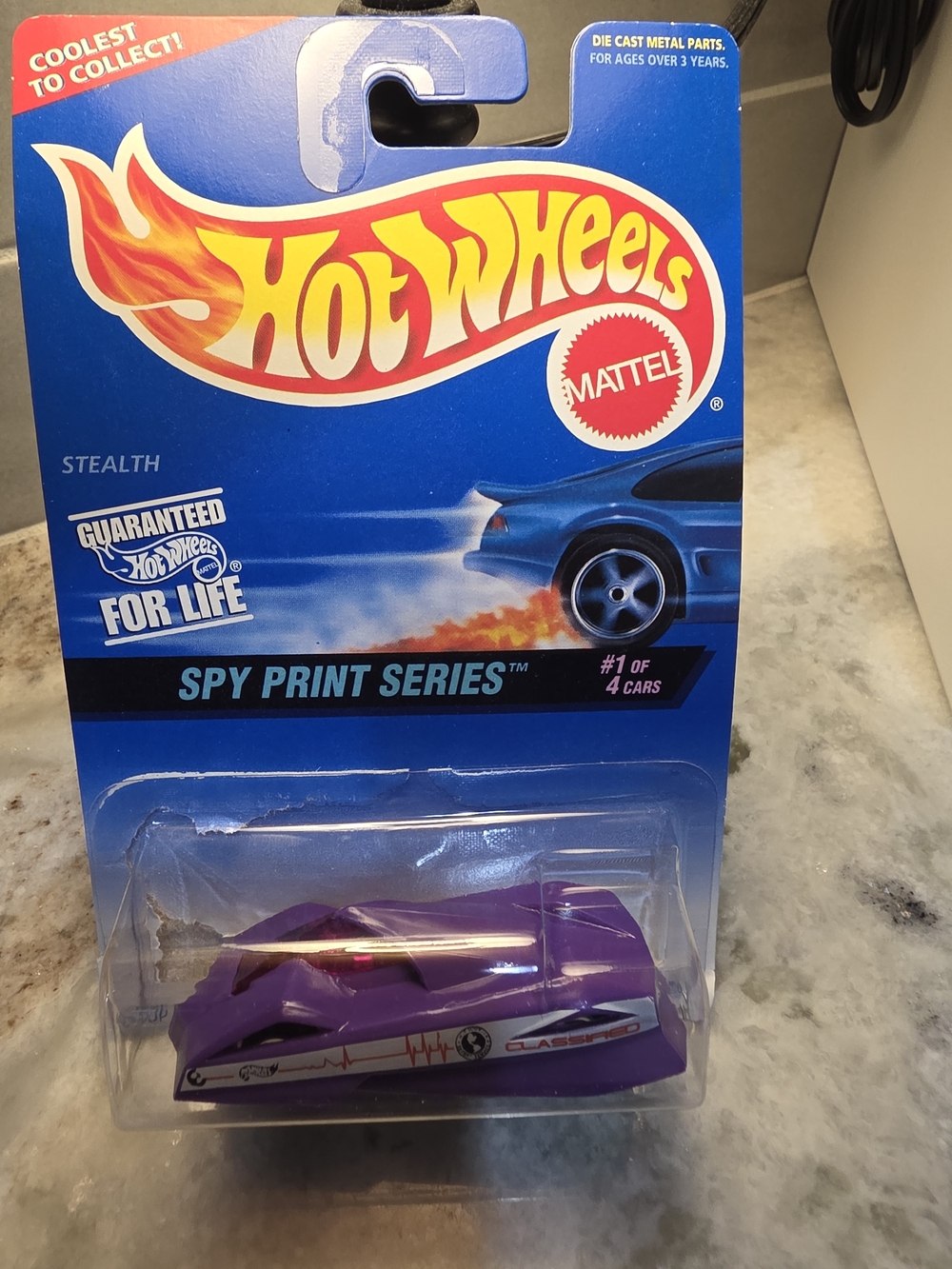 Mattel Hot Wheels Spy Print Series Stealth Car - Purple
